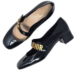 Dior black patent calfskin Baby D Mary Jane pumps.